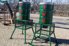 Short deer feeders with and without skids - made with reinforced steel drums and includes solar-power timer
